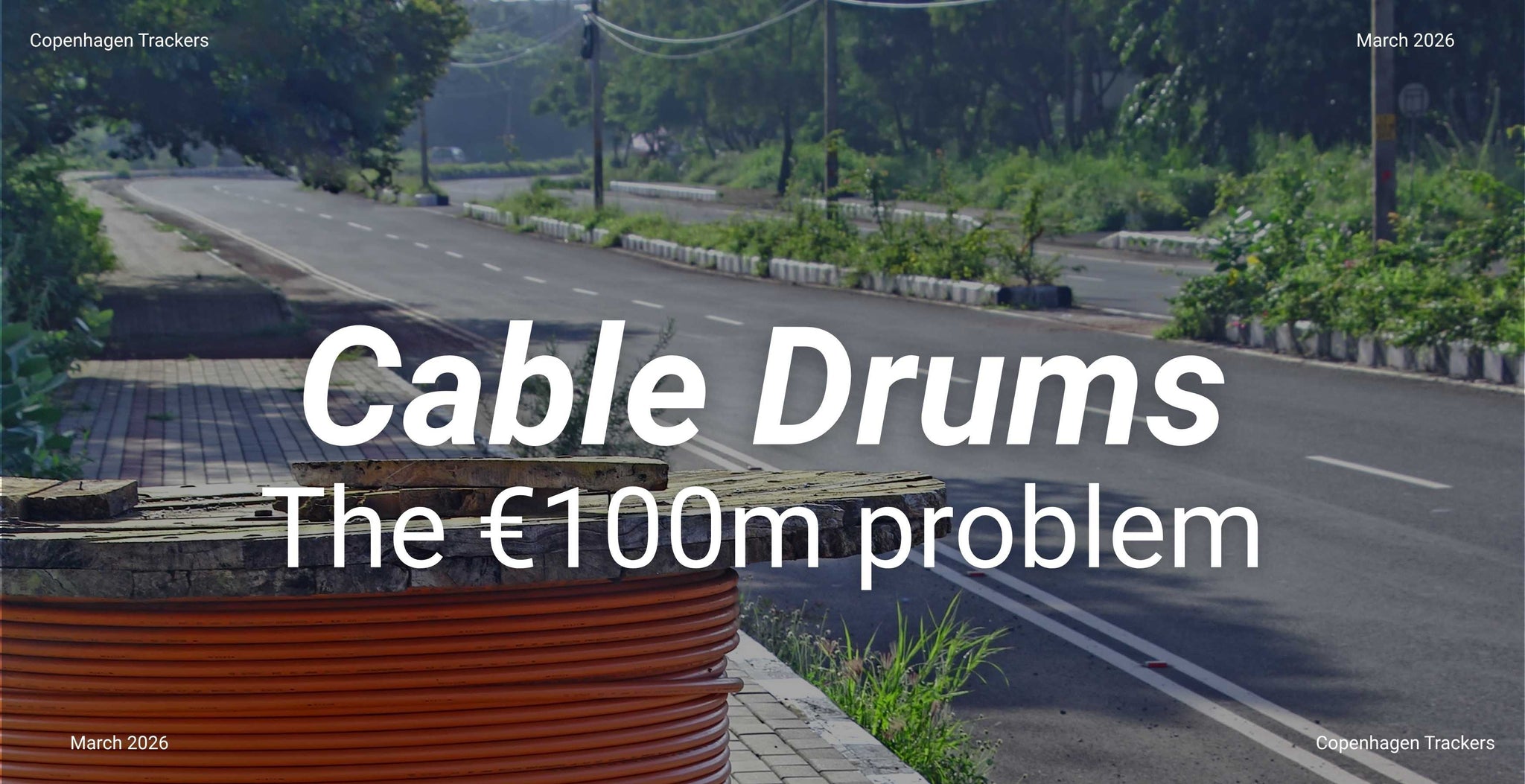 Road with cable drums and text overlay 'Cable Drums The €100m problem' on a blue filter.