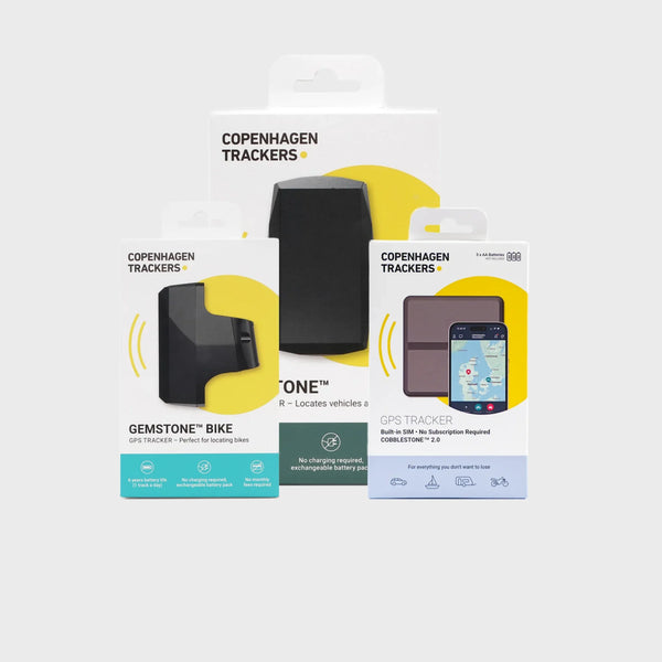 Three Copenhagen Trackers GPS tracker products in retail packaging: Gemstone, Gemstone Bike, and Cobblestone 2.0