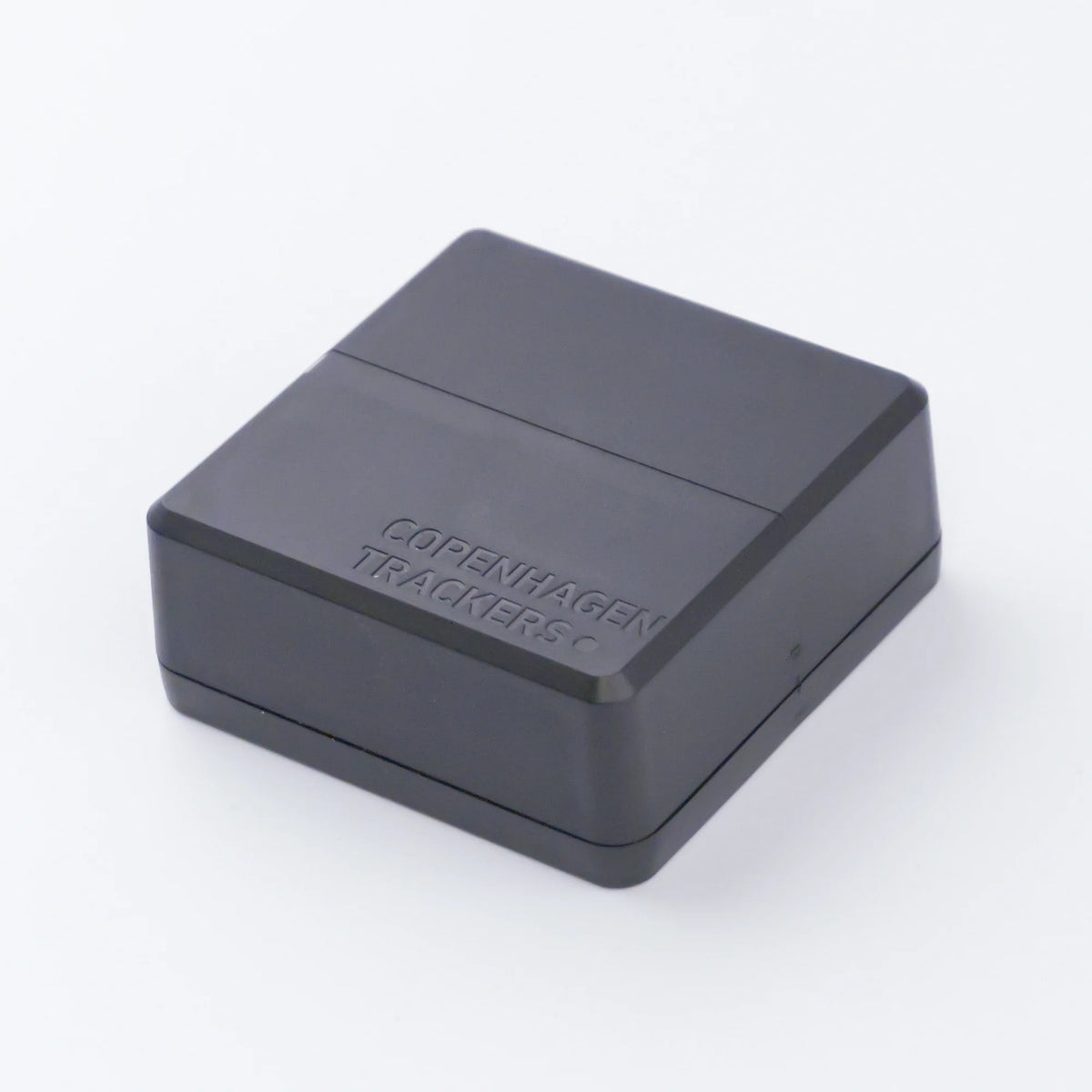 Cobblestone 2.0 GPS tracker with 'Copenhagen Trackers' branding on a white background