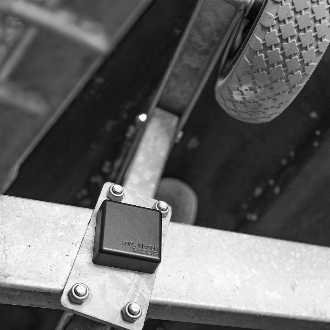GPS tracker hanging on the trailer frame